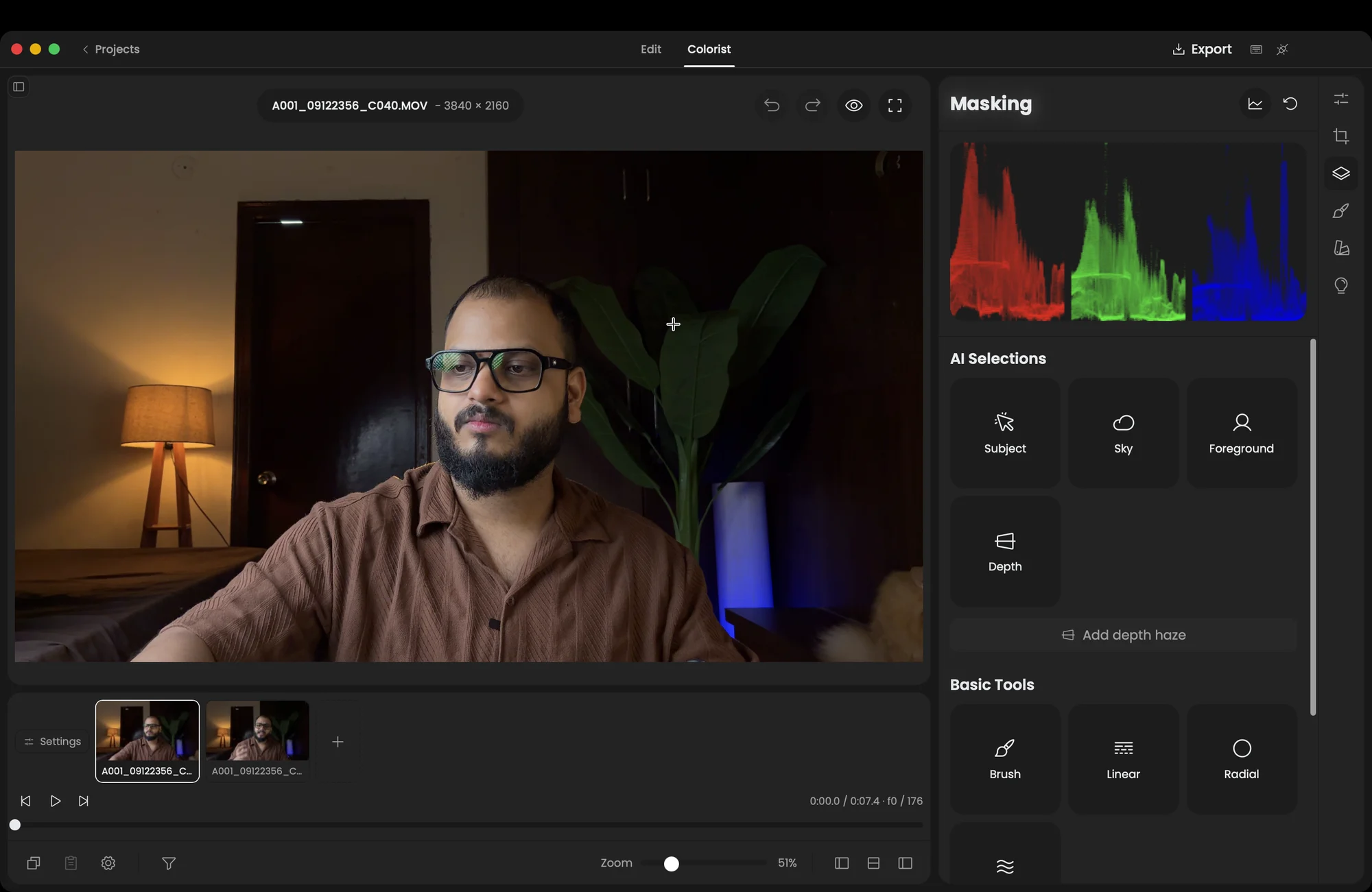 The Apelles Colorist room: the same clip full-frame, a live RGB parade above the Masking panel, and AI selections for Subject, Sky, Foreground and Depth alongside brush, linear and radial masks.